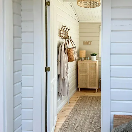 Charming Log Close To The Water And